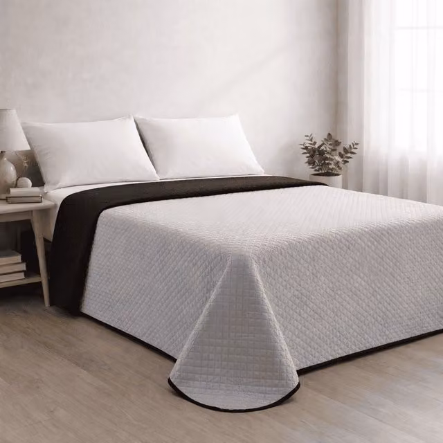 Colcha reversible acolchada Donegal Collections en gris y negro para cama de 90 cm