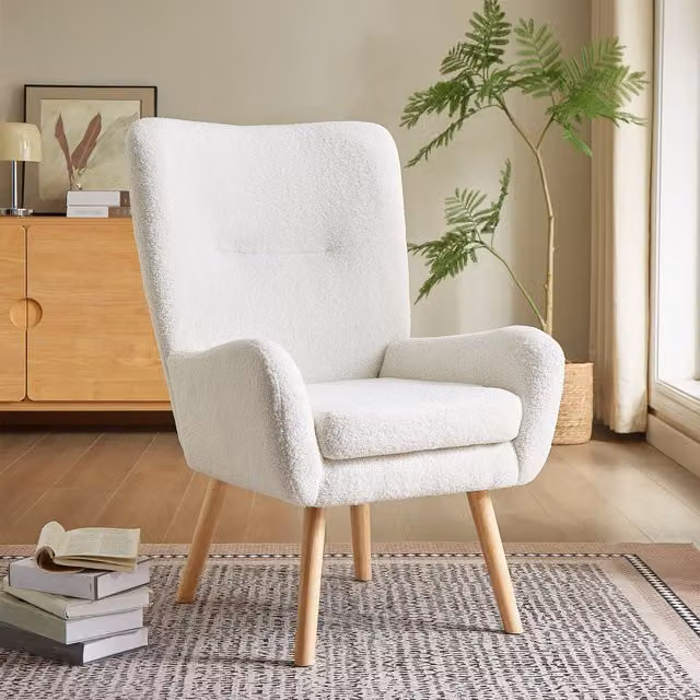 Sillón escandinavo moderno Gaïa de Sicaan con tejido de rizo blanco y estructura de madera sólida