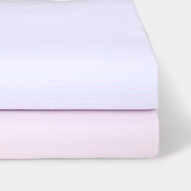 Pack de 2 sábanas bajeras ajustables Cotton Juice Baby Home de tejido jersey con diseño de rayas en color rosa, An/P/Al: 60 x 120 cm