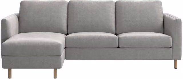 Sofá individual con chaiselongue izquierda Ravello de BoConcept en color gris con tapizado de terciopelo y estructura de madera de roble de estilo escandinavo