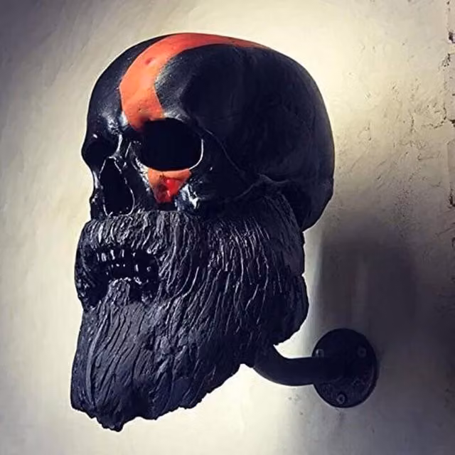 Soporte de pared con forma de casco de motocicleta y diseño de calavera de XISRENS en color negro y material plástico para decoración de pared