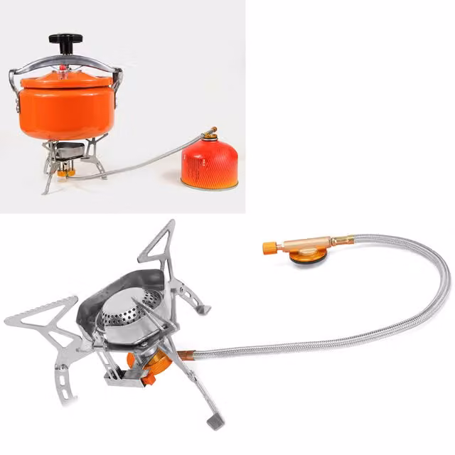 Mini estufa de gas Infinite de acero inoxidable color plata con paravientos integrado y soporte para parrilla de pollo