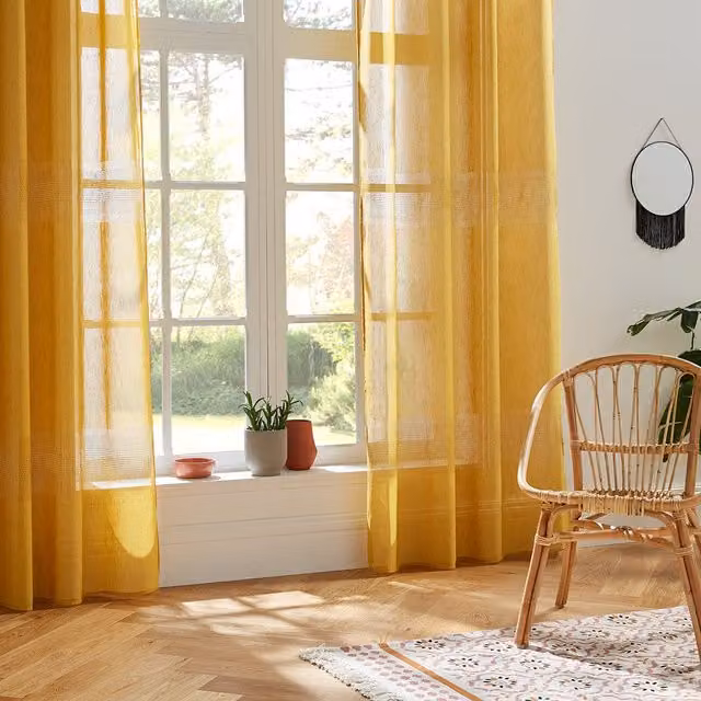Cortina de voile transparente Atmosphera en color amarillo con ojales, An/Al: 140 x 240 cm