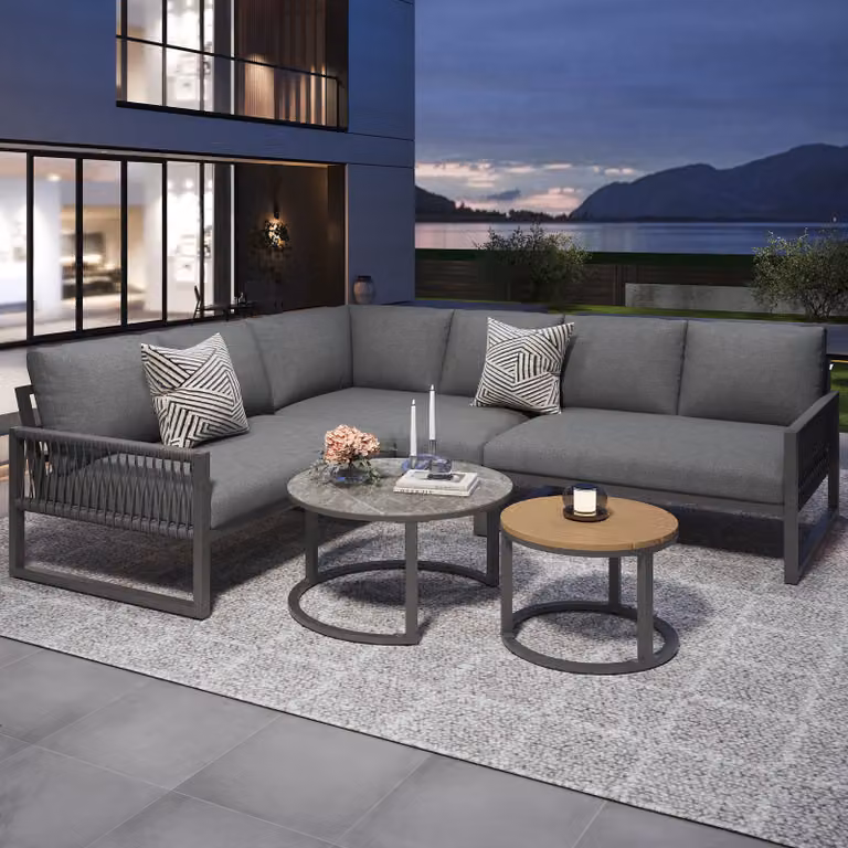 Conjunto de mobiliario de jardín STILVORA de 6 plazas con sofás en forma de L, mesa de centro y cojines, estructura de acero y tela gris