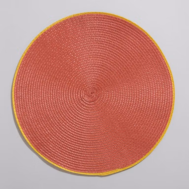 Mantel individual redondo de Maison du Monde en plástico color naranja con borde amarillo