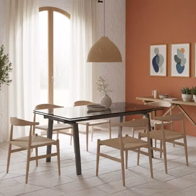 Mesa extensible de comedor Duzzle con sobre de vidrio transparente y estructura gris de estilo moderno