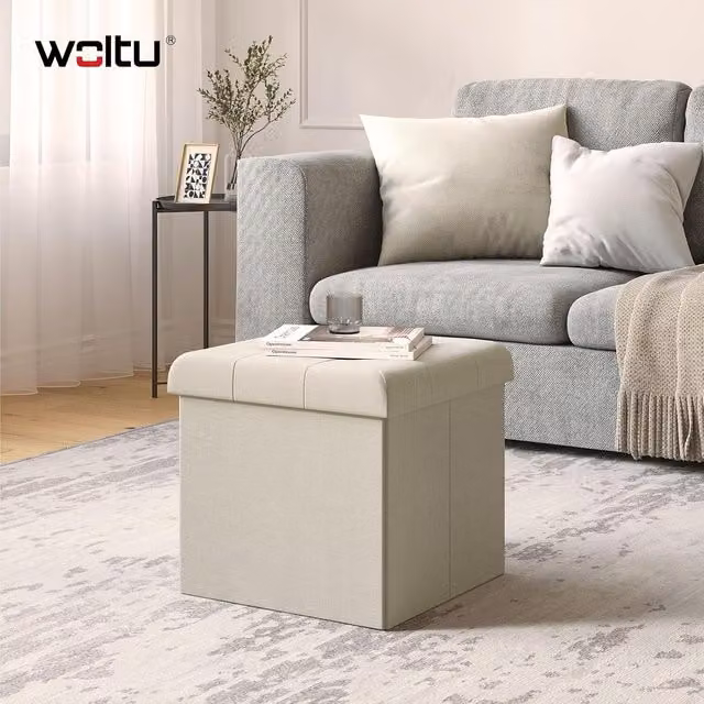 Puf Contenedor Woltu en color beige, taburete plegable y reposapiés con diseño de cubo moderno para tu hogar