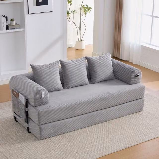 Sofá cama plegable KELLANY de tela de pana gris con estructura metálica y cojines, An/P/Al: 140 x 190 x 67 cm