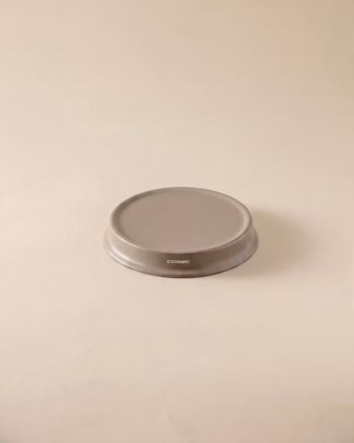 Jabonera de encimera Cosmic Geyser de acero inoxidable en color beige o gris