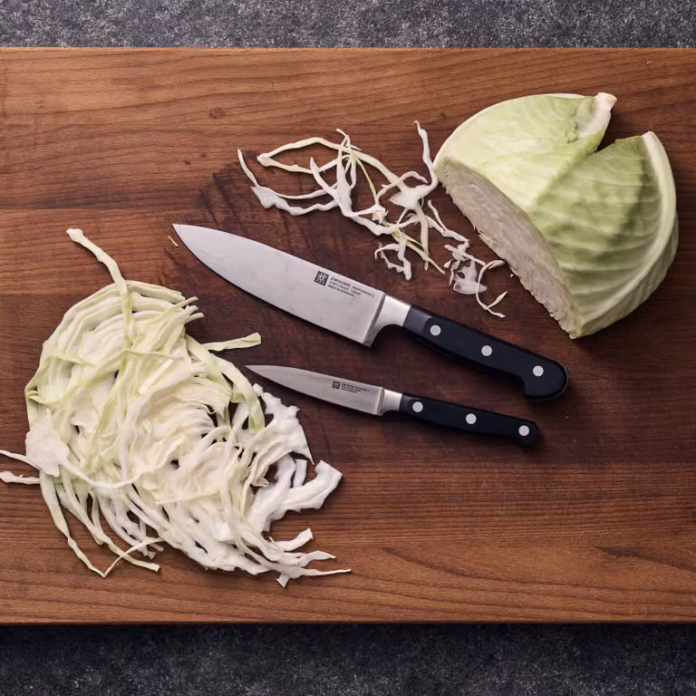 Juego de 2 cuchillos Zwilling Professional S de acero inoxidable con mango de plástico en negro y plata, incluye cuchillo de chef y cuchillo de oficio