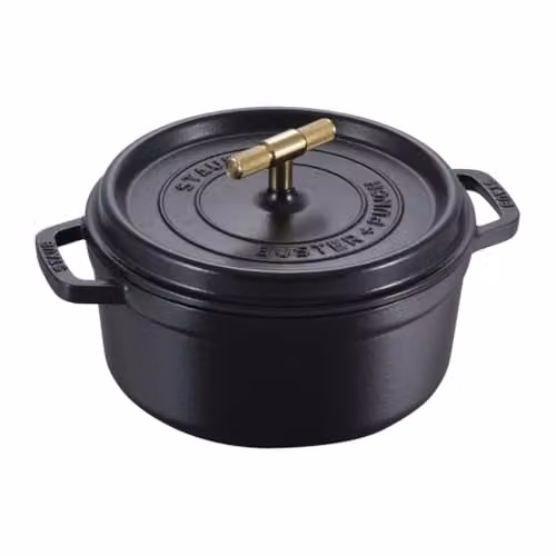 Cocotte Staub Buster & Punch en hierro fundido esmaltado color negro y dorado de 24 cm