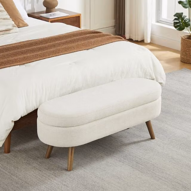Banco de almacenamiento de chenilla HAUSS SPOLE con diseño ovalado moderno y estructura de MDF, color beige, Ancho: 110 cm