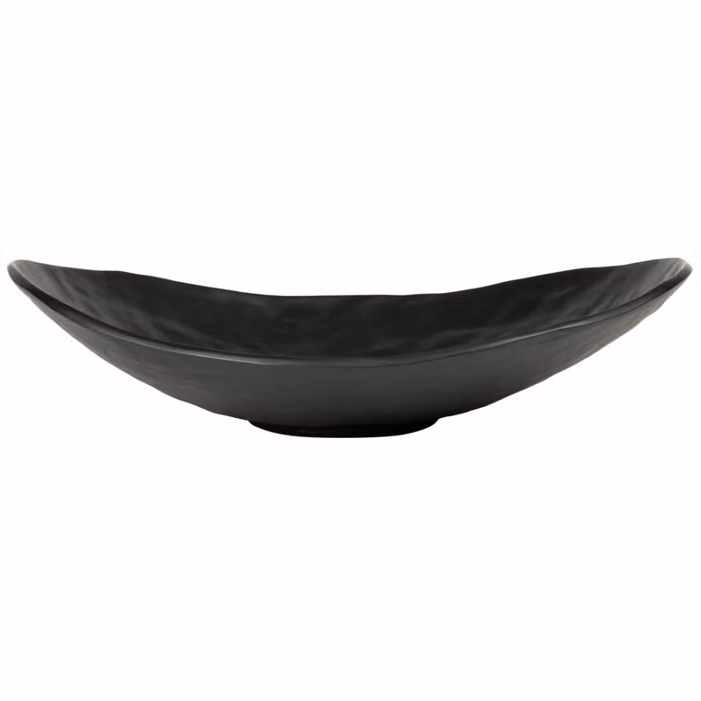 Cuenco decorativo ovalado de metal negro de Maisons du Monde con estilo minimalista para mesa