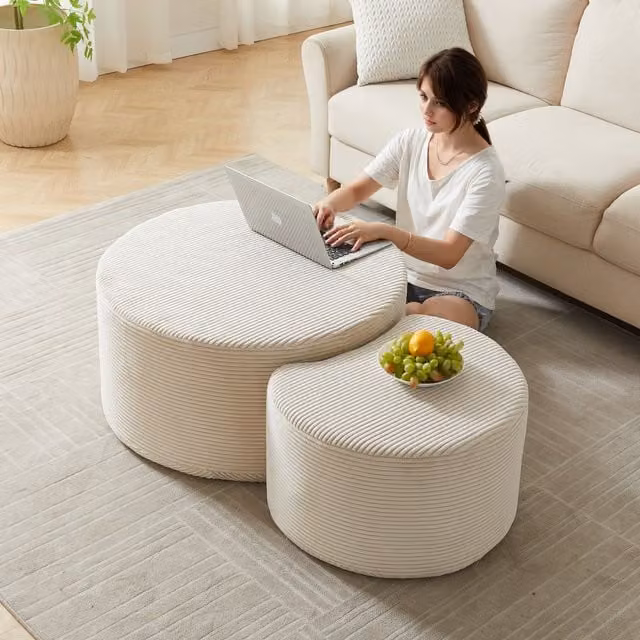 Juego de 2 mesas de centro redondas tapizadas KELLANY para salón, diseño moderno con estructura de espuma y acabado liso en colores blanco, beige o negro