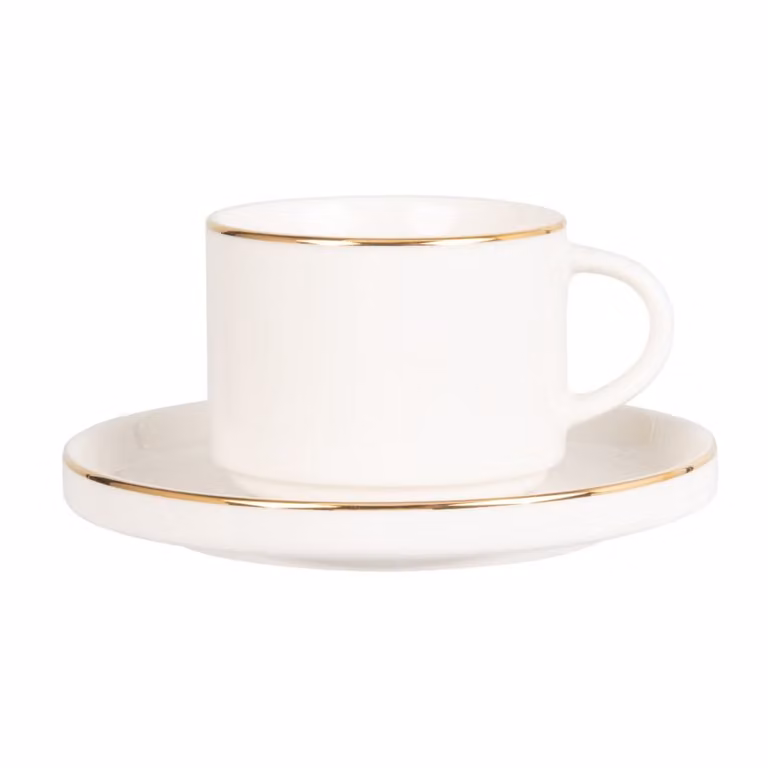 Taza de té con platillo de porcelana Maisons du Monde en color blanco y dorado