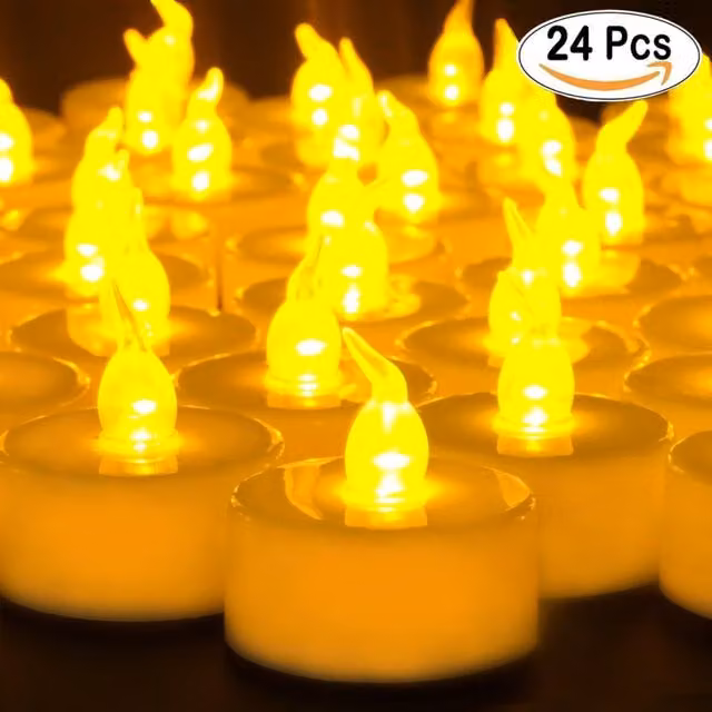 Set de 24 velas LED tipo tealight Trade Shop Traesio en color amarillo y luz blanca para decoración de mesa