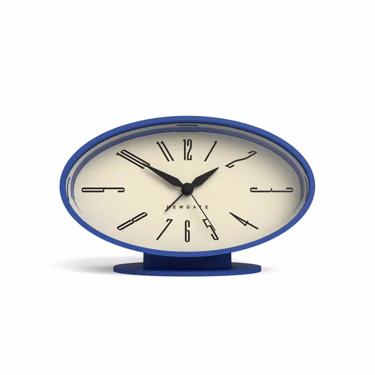 Reloj despertador de mesa Newgate con diseño retro ovalado en color azul y mecanismo analógico silencioso