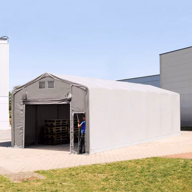 Carpa industrial TOOLPORT de PVC gris con puerta levadiza y estructura de acero galvanizado, An/P/Al: 5 x 12 x 3,9 m