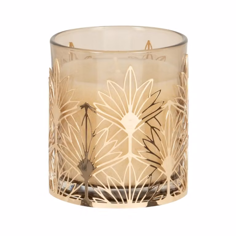 Vela perfumada tealight de Maisons du Monde en color beige y metal dorado con acabado de cristal redondo estilo glamour