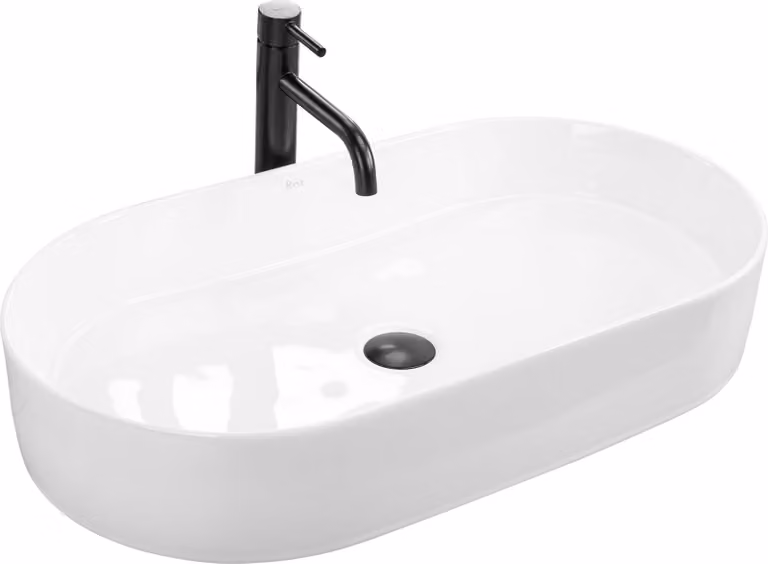 Lavabo de encimera Nadia 70 de Rea en cerámica blanca con forma ovalada