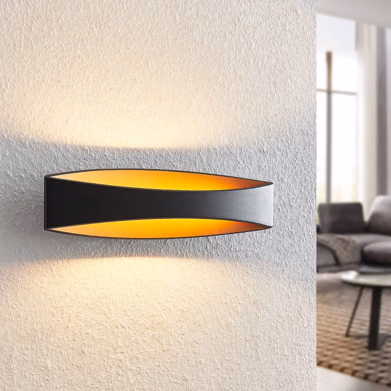 Aplique de pared LED Arcchio de aluminio moderno en negro y dorado para salón, comedor o dormitorio