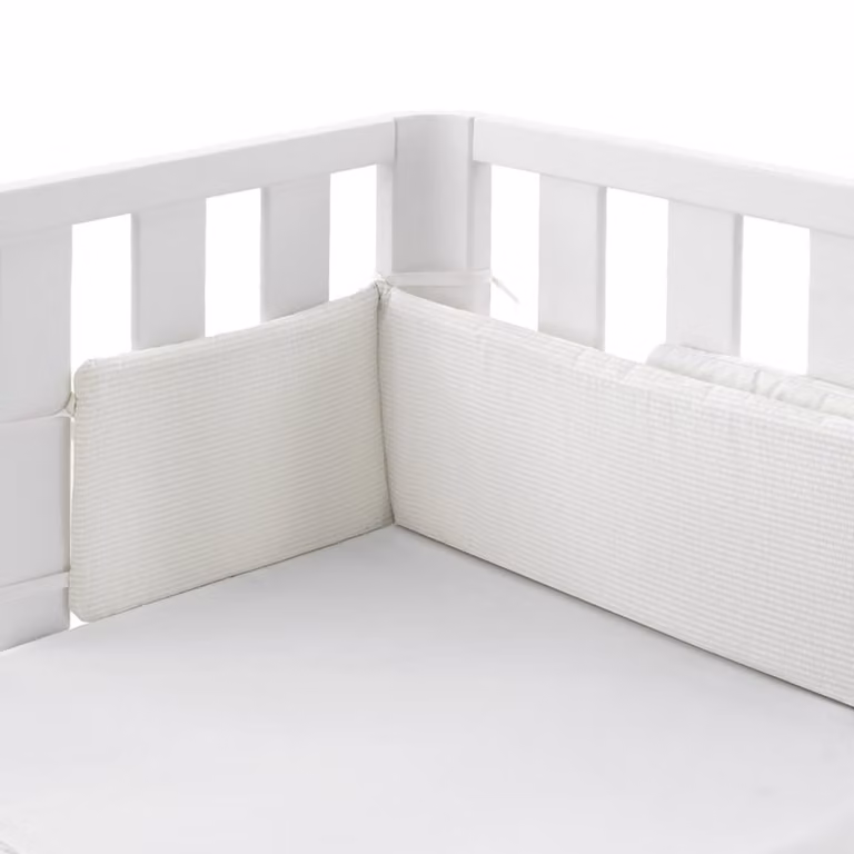 Protector de cuna Doco Cambrass color crema, de algodón, An/P/Al: 103 x 19 x 2 cm