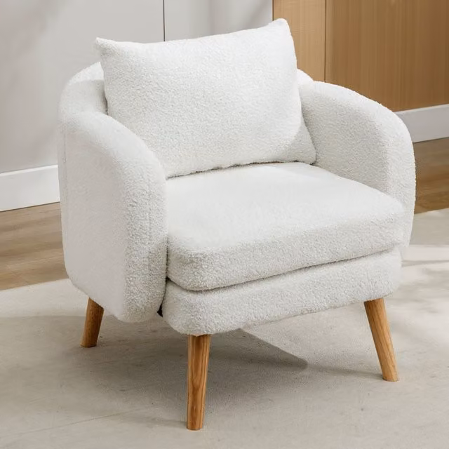 Sillón individual moderno Kellany tapizado en terciopelo y boucle color blanco con estructura de madera y metal