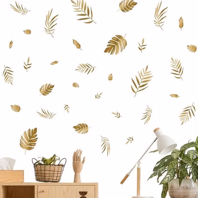 Vinilo decorativo de pared NEBELMEER con diseño de hojas doradas y motivos botánicos para tu salón o dormitorio