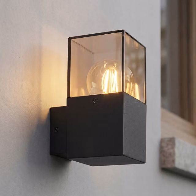 Aplique de pared Rabalux moderno con acabado en metal y cristal, compatible con bombilla E27 de hasta 60W, disponible en blanco o negro
