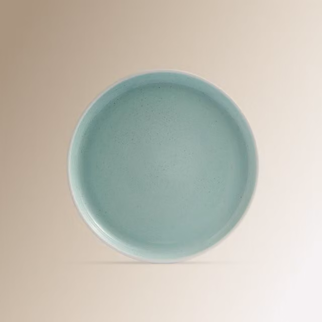 Plato de postre de cerámica Mini Home de El Corte Inglés en color azul turquesa, apto para lavavajillas y microondas