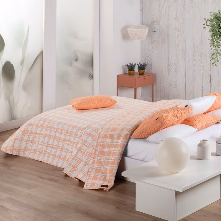Colcha cubrecama jacquard Manterol con diseño de cuadros en color melocotón para cama de 105 cm