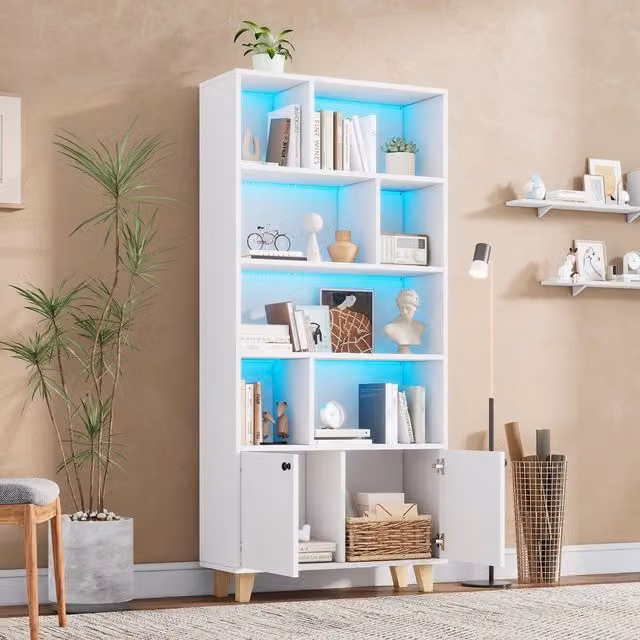 Librería Stilvora de 2 puertas y 7 compartimentos con iluminación LED multicolor, fabricada en MDF y madera maciza de pino en color blanco. An/P/Al: 80 x 30 x 173 cm