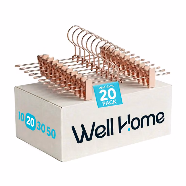 Set de 20 perchas de acero WELLHOME con pinzas antideslizantes y gancho giratorio en color rosa y dorado