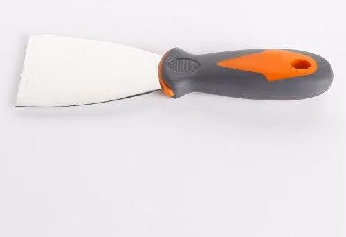 Espátula flexible de acero al carbono Alyco con mango bimaterial antideslizante naranja de 40 mm