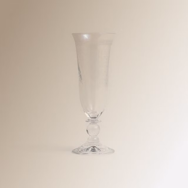 Copa de champán Dots de El Corte Inglés en cristal transparente con diseño de puntos