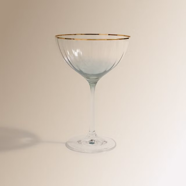 Copa de champán Pompadour Lido El Corte Inglés de cristal transparente con detalles en oro y verde