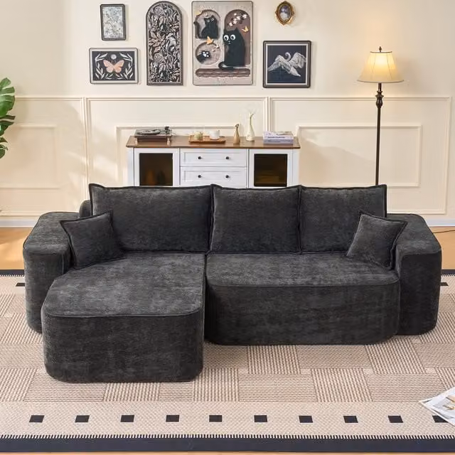 Sofá esquinero reversible de 4 plazas STILVORA en forma de L, tapizado en tejido negro de estilo minimalista para salón