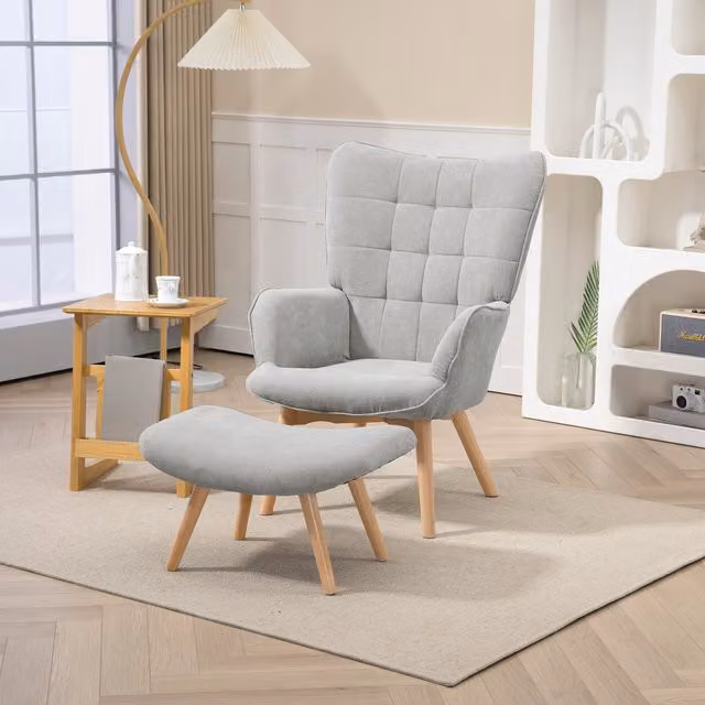 Sillón con reposapiés HOMCOM de respaldo alto, tapizado en tela de pana gris con patas de madera para salón o dormitorio