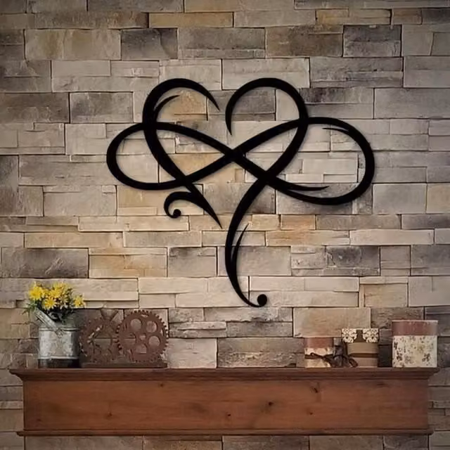Decoración de pared de metal XISRENS con diseño de corazón infinito en color negro, An: 35 cm, Al: 29 cm