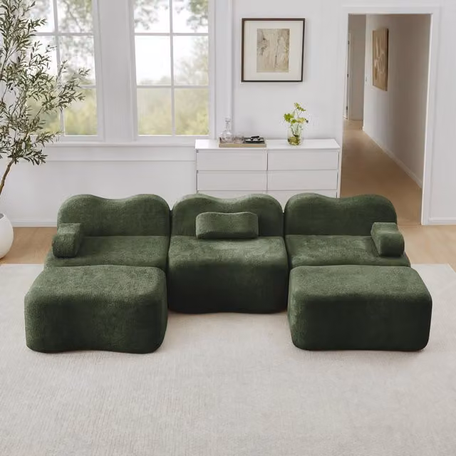 Sofá modular de 3 plazas HAUSS SPOLE en terciopelo verde con 2 reposapiés y diseño ondulado moderno para salón
