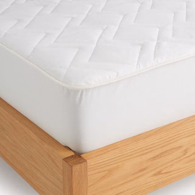 Protector acolchado de colchón Algodón Confort Natural de El Corte Inglés, color blanco, An/P: 90 x 200 cm